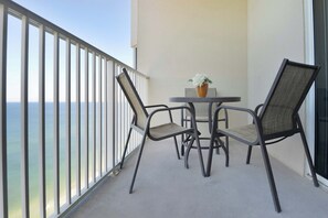 Outdoor dining - Gulf-front condo w/ 2 lagoon pools, hot tubs, beach service & fitness center (Panama City Beach)