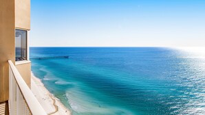 A beachfront hotel with a view of the ocean and a pier. - Spacious Gulf front condo w/shared hot tub, pools, gym - close to dining (Panama City Beach)