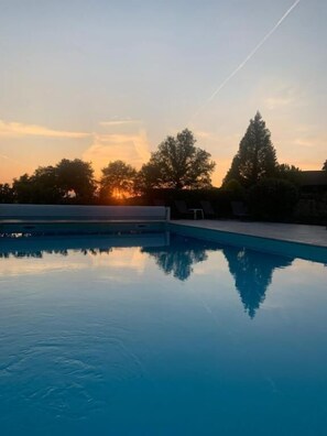 Seasonal outdoor pool, open 9:00 AM to 7:00 PM, free cabanas