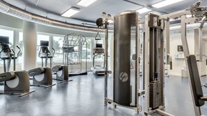 A gym with various exercise machines, including treadmills and weightlifting equipment. - Sunny Waterscape ground-floor condo with pools, hot tubs, & stunning Gulf views (Fort Walton Beach)