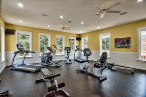 A gym with treadmills, stationary bikes, and a rowing machine. - Inviting townhome in Miramar Beach with bay view & resort pools (Miramar Beach)