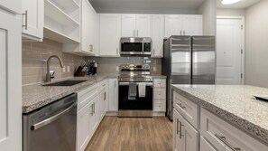 Fridge, dining tables - Landing | Spectacular 1BD, Gym, Yoga Studio (Four Corners)