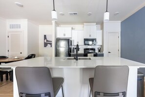 Fridge, dining tables - Landing | Modern 1BD, Clubhouse, Gym (Asheville)