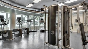 A gym with various exercise equipment, including treadmills and weight machines. - 6th Floor Welcoming Condo At Waterscape 490 Feet Of Private Beach (Fort Walton Beach)