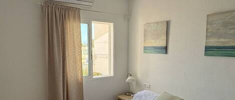 2 bedrooms, in-room safe, iron/ironing board, travel cot