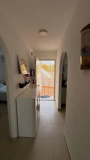 2 bedrooms, in-room safe, iron/ironing board, travel cot