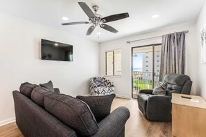 TV, DVD player - Beachfront retreat with shared pool and fitness center (Fort Morgan)