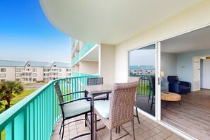 Outdoor dining - Waterfront condo with shared pool & hot tub - near dining & the beach (Fort Morgan)