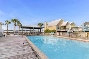 Pool - Waterfront condo with shared outdoor pool, furnished balcony, & beach access (Gulf Shores)