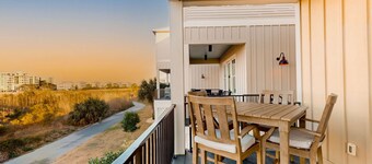 Pristine waterfront escape just steps to beach with community pool, washer dryer