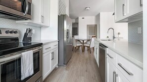 Fridge, dining tables - Landing | Beautiful 2BD, Courtyard, Clubhouse (Naples)
