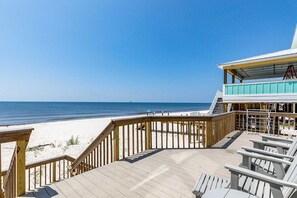 A wooden deck with a view of the beach and ocean. - Bay Walk | Gulf-Front Beach House on Fort Morgan’s Quiet Coast (Fort Morgan)