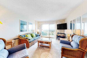 TV, offices - Oceanfront condo with Gulf-view balcony, beach access, pool, WiFi, & central AC (Fort Morgan)