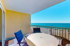 Outdoor dining - Clearwater condo with bunk room, pool, & balcony - walk to waves (Gulf Shores)