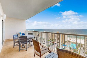 Outdoor dining - Bright & breezy condo with Gulf view, pools & beach access (Gulf Shores)
