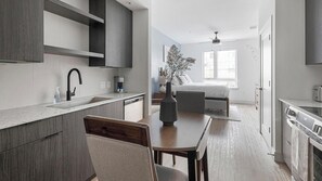 Fridge, dining tables - Landing | Amazing Studio, Game Room (Austin)
