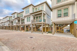 Exterior - Coastal, group-friendly getaway with outdoor pool access and fishing pier (Gulf Shores)