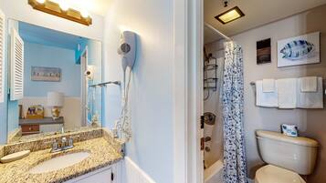Shower, hair dryer, towels