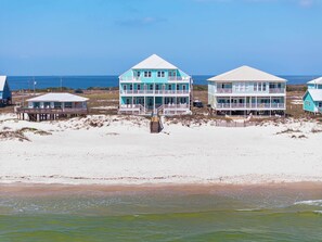 Exterior - Completely renovated oceanfront home with shared outdoor pool, views, & balcony (Fort Morgan)