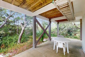 Outdoor dining - Duplex home with two-level deck, beach access, hot tub, & balcony (Fort Morgan)