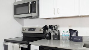 Fridge, dining tables - Landing | Chic 1BD, Gym, Clubhouse (Kissimmee)