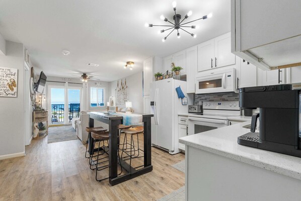 Fridge, microwave, oven, stovetop - Renovated Gulf-side condo with pools, hot tub, & fitness center (Gulf Shores)