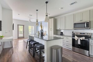 Fridge, dining tables - Landing | Stylish 1BD in Westport (Leland)