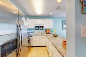 Fridge, microwave, oven, stovetop - Stunning water-view condo with pool - steps away from the beach (Gulf Shores)