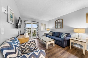 TV, DVD player, offices - Coastal 3rd floor condo with pools, hot tubs, tennis, balcony, & elevator (Fort Morgan)