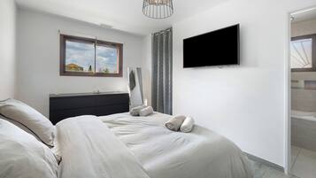 2 slaapkamers, een strijkplank/strijkijzer, wifi, beddengoed