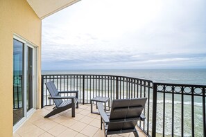 Terrace/patio - Gulf-front condo with balcony overlooking beach, pool, new furniture, & W&D (Gulf Shores)