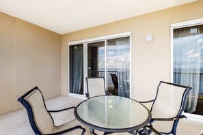 Outdoor dining - 14th-floor family-friendly Gulf-front condo with balcony, hot tub, pool, & AC (Gulf Shores)