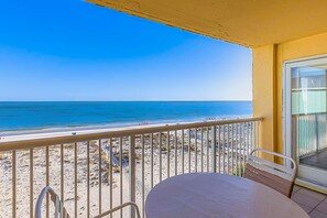 Outdoor dining - Beachfront Condo with Shared Outdoor Pool, Central AC, Private Balcony, Views, WiFi (Gulf Shores)