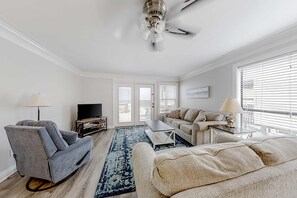 TV, offices - Beachfront home with private balcony, 2 beachside decks, central AC and WiFi (Gulf Shores)