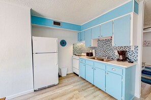 Fridge, microwave, oven, stovetop - Comfortable single-level condo with WiFi, pool, & central AC (Gulf Shores)