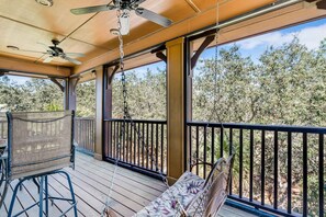 Terrace/patio - Private home in a golf community with wraparound porch and a pool shared with the adjacent sister property (Gulf Shores)