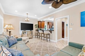 TV - Private home in a golf community with wraparound porch and a pool shared with the adjacent sister property (Gulf Shores)