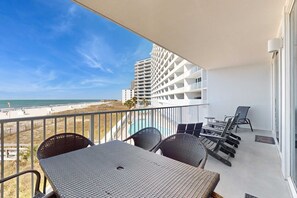 Outdoor dining - Gulf-Front Condo on the Beach w/ Balcony & Shared Pools/Hot Tubs/Sauna/Gym (Gulf Shores)