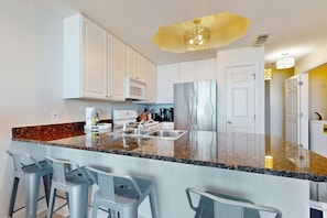 Fridge, microwave, oven, stovetop - Gulf-Front Condo on the Beach w/ Balcony & Shared Pools/Hot Tubs/Sauna/Gym (Gulf Shores)
