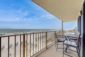 Outdoor dining - Beachfront condo with Gulf views, balcony, pool & AC - snowbird-friendly (Gulf Shores)