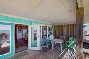 Outdoor dining - Beachfront Home with Covered Deck, Gulf Views, Central AC, WiFi & Laundry (Gulf Shores)