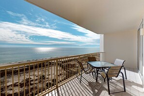 Outdoor dining - Gulf-front 10th-floor condo with beach views, sauna, gym, volleyball, pools, AC (Gulf Shores)