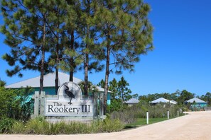 Property grounds - Modern beach home with screened porch, on-site pool, AC, & W&D (Gulf Shores)