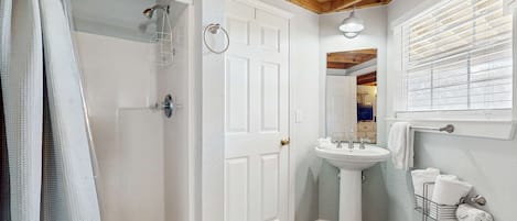 Shower, hair dryer, towels