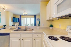 Fridge, microwave, oven, stovetop - The Dunes 704 | Beachside Condo with Gulf Views and Fitness Center (Gulf Shores)