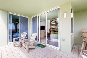 Terrace/patio - Peaceful water view condo with sauna, pool, tennis court, W&D, hot tub, & patio (Gulf Shores)