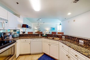 Fridge, microwave, oven, stovetop - Peaceful water view condo with sauna, pool, tennis court, W&D, hot tub, & patio (Gulf Shores)