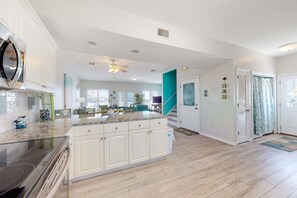 Fridge, microwave, oven, stovetop - Dog-friendly townhome steps to beach with pool access & two balconies (Gulf Shores)