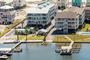 Exterior - Waterfront condo with shared pool & pier, gas grill, balcony & AC (Gulf Shores)