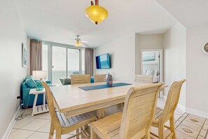Dining - Bright beachfront condo w/ private balcony, zero-entry pool, gym, & hot tub (Gulf Shores)